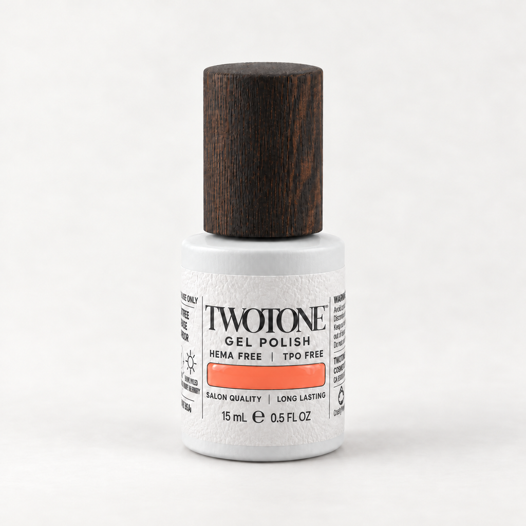 TWOTONE Coral Whisper gel polish, 15 mL, white bottle with dark wooden cap and warm orange coral swatch
