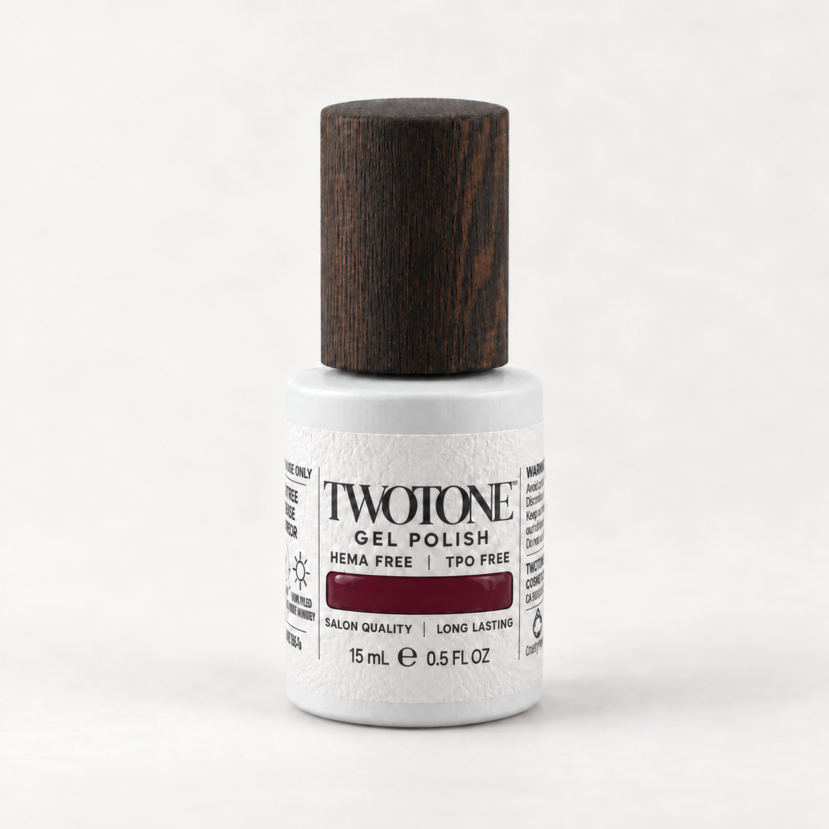 TWOTONE Deep Plum gel polish, 15 mL, white bottle with dark wooden cap and dark wine burgundy swatch
