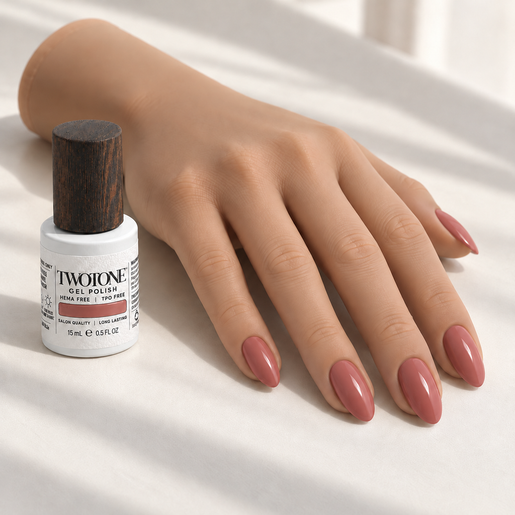 Illustrative Fluster manicure on a silicone practice hand beside the TWOTONE bottle; color appearance may vary